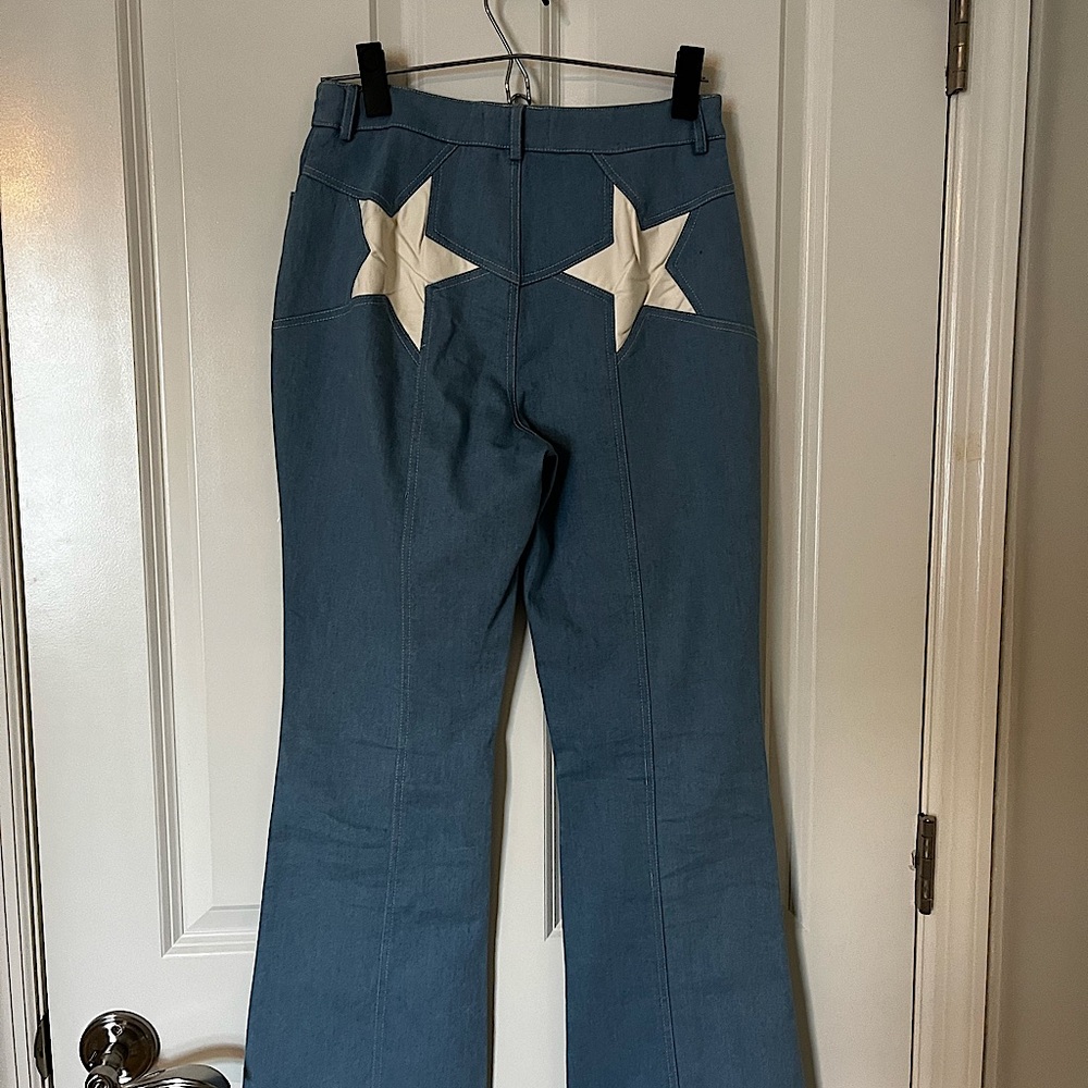 White leather star flare jeans